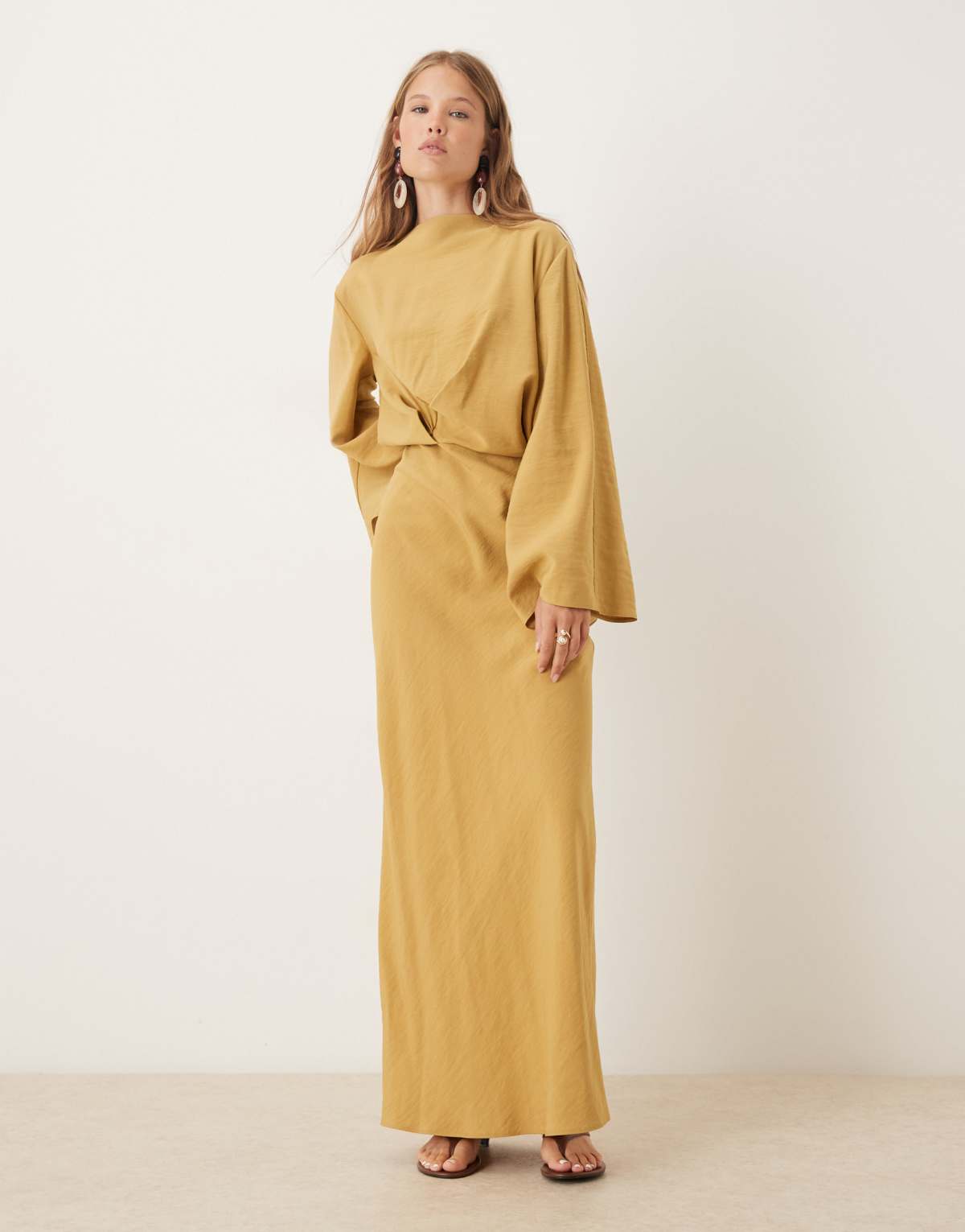 ASOS DESIGN long sleeve tucked waist bias maxi dress in gold