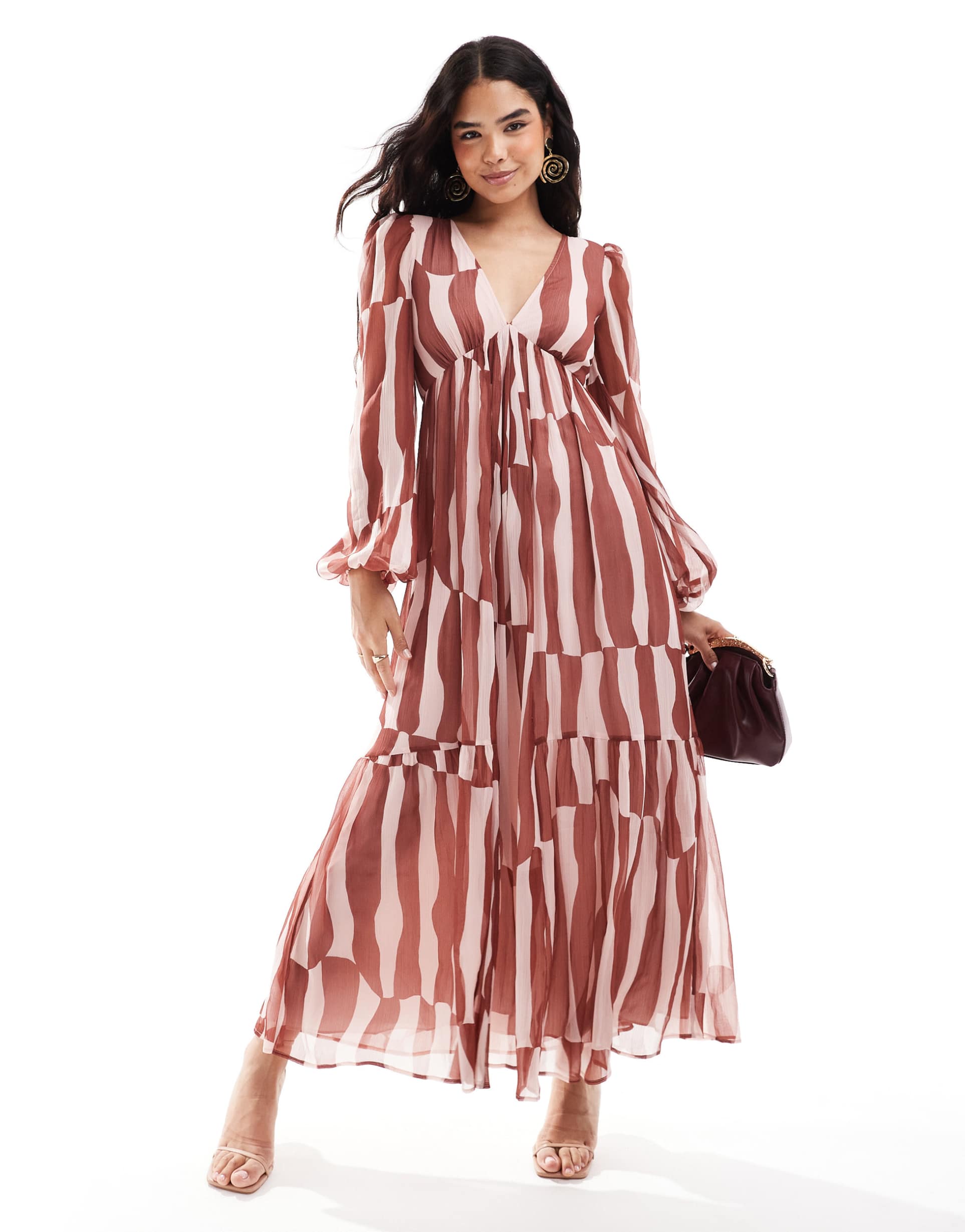 asos design long sleeve v neck tiered maxi dress in rust abstract print