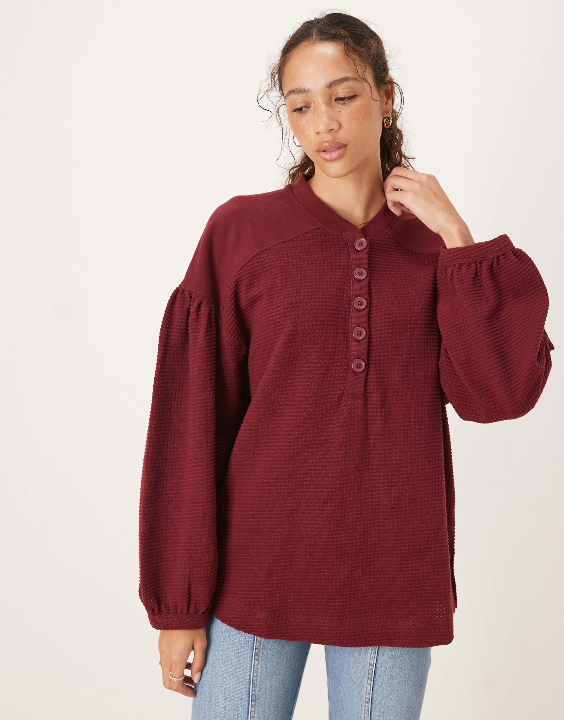 asos design long sleeve waffle henley top with puff sleeve detailing in washed burgundy