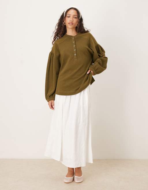 ASOS DESIGN long sleeve waffle henley top with puff sleeve detailing in washed olive, 2 of 4