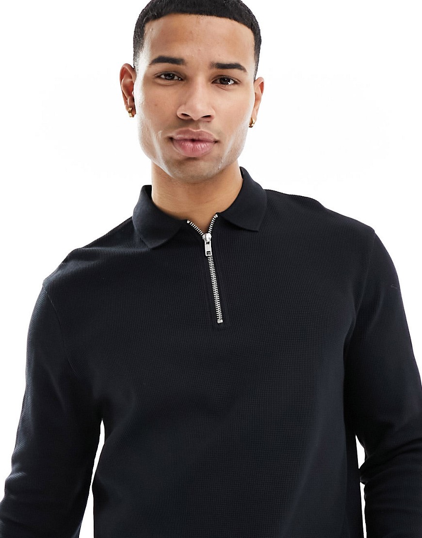 ASOS DESIGN long sleeved waffle polo with zip in black