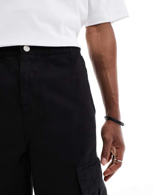 ASOS DESIGN longer length cargo shorts in black, 4 of 5