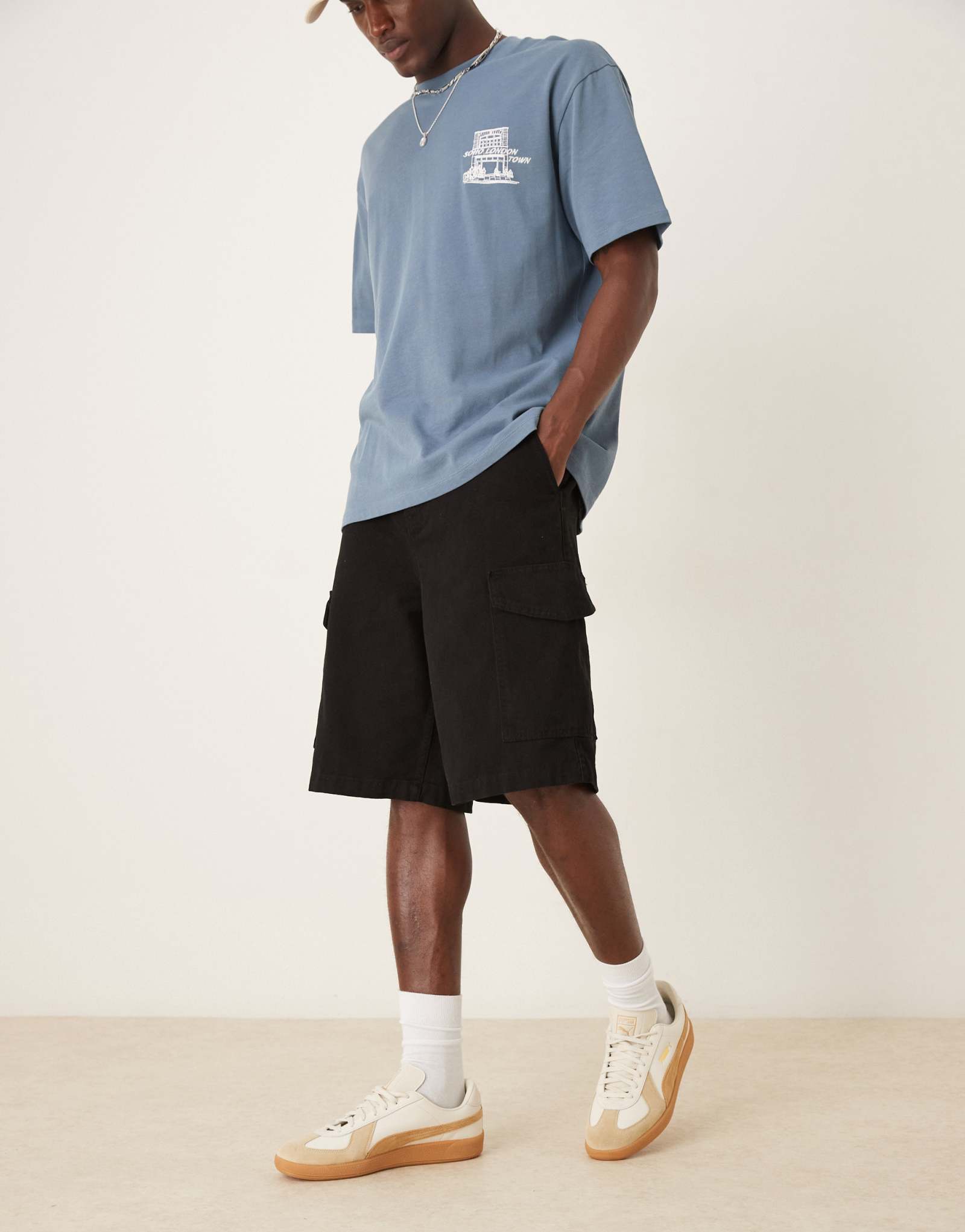 Удлиненные шорты-карго от ASOS DESIGN черного цвета