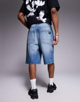 ASOS DESIGN longer length carpenter denim jorts in mid wash blue