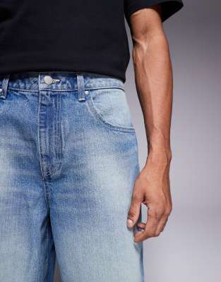 ASOS DESIGN longer length carpenter denim jorts in mid wash blue