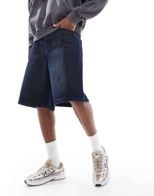 ASOS DESIGN longer length denim jorts in mid wash blue 