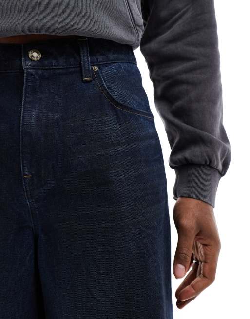 ASOS DESIGN longer length denim jorts in mid wash blue 