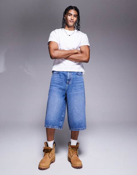 ASOS DESIGN longer length denim jorts in mid wash blue - view 1