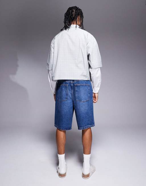 ASOS DESIGN longer length denim jorts in mid wash blue