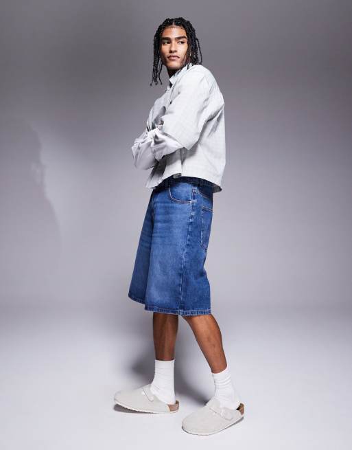 ASOS DESIGN longer length denim jorts in mid wash blue