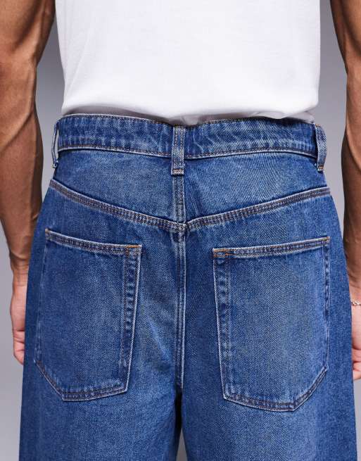 ASOS DESIGN longer length denim jorts in mid wash blue