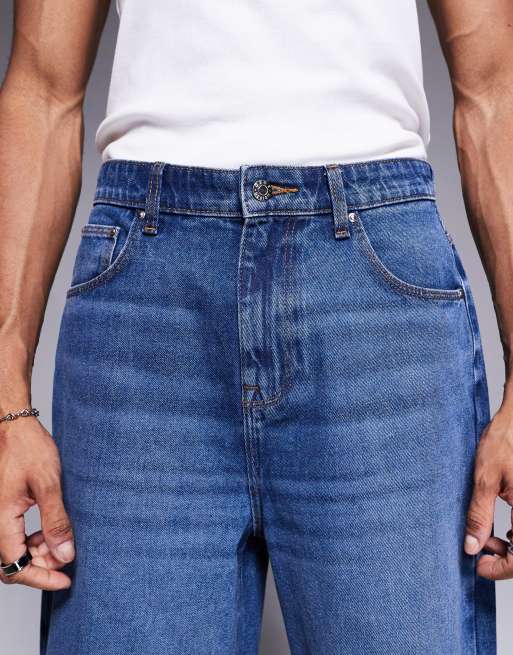 ASOS DESIGN longer length denim jorts in mid wash blue