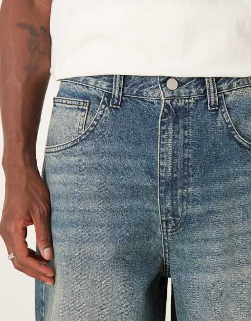 ASOS DESIGN longer length denim jorts in mid wash blue