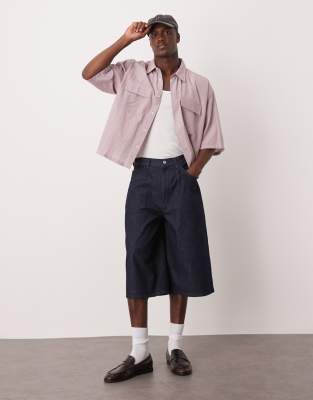 ASOS DESIGN longer length denim jorts with pleats in raw wash-Blue