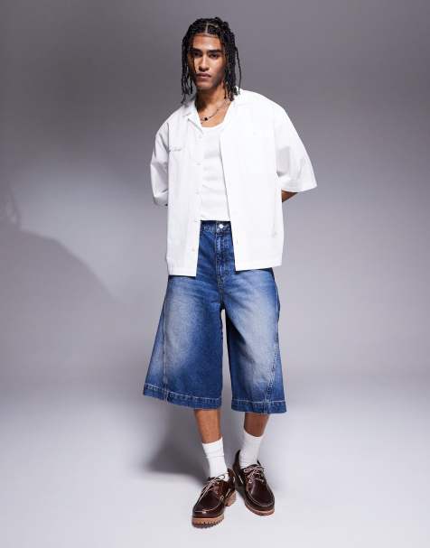 ASOS DESIGN longer length denim jorts with twisted seam in mid wash blue - view 1