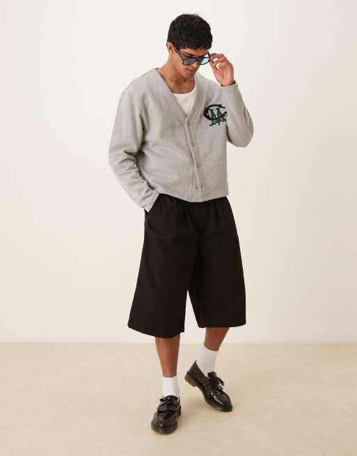 ASOS DESIGN longer length jorts with belt and pleats in black