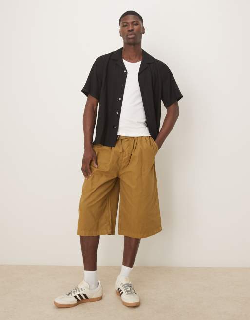 ASOS DESIGN longer length jorts with belt and pleats in olive green