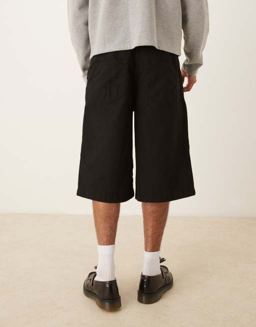 ASOS DESIGN longer length pleated shorts with belt in black