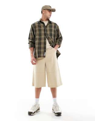 ASOS DESIGN longer length shorts in beige-Brown
