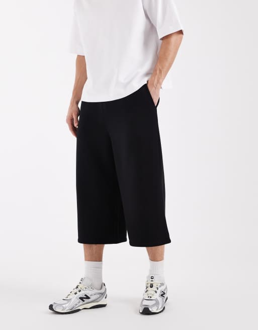 ASOS DESIGN longer length shorts in black