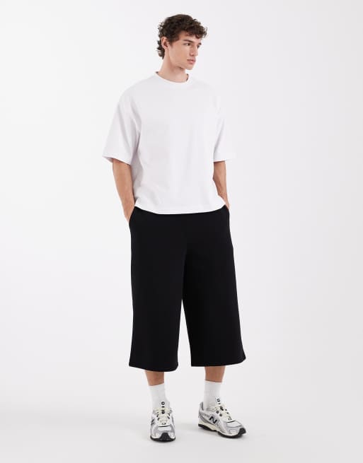 ASOS DESIGN longer length shorts in black