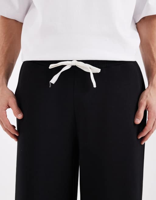 ASOS DESIGN longer length shorts in black