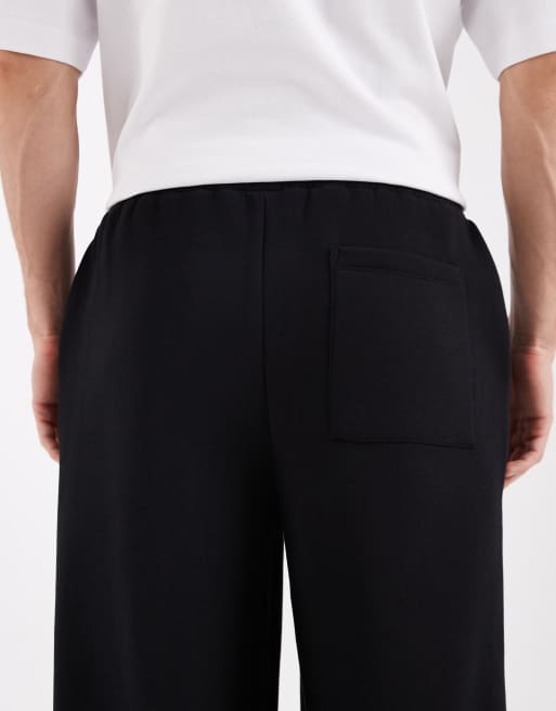 ASOS DESIGN longer length shorts in black