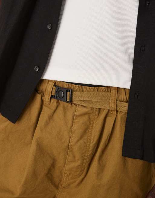 ASOS DESIGN longer length shorts with belt and pleats in olive green, 2 of 5