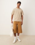 [ASOS DESIGN] ASOS DESIGN longer length shorts with embroidered back pockets in tan-Brown W30 TAN