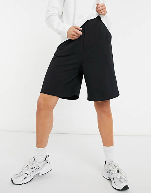 ASOS DESIGN longer length sweat shorts in black