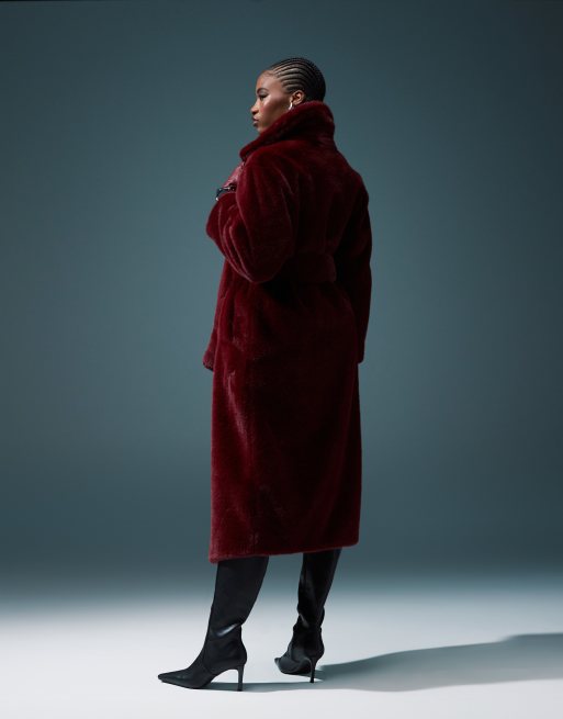 ASOS DESIGN longline belted faux fur coat in burgundy