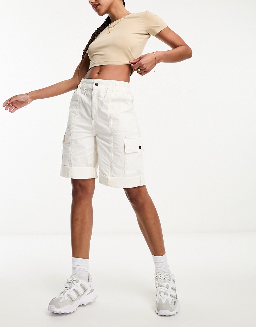 ASOS DESIGN longline cargo short with contrast stitch in white-Neutral