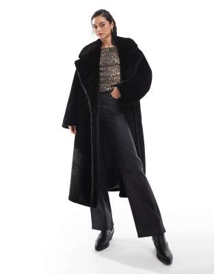 longline chuck on faux fur coat in black