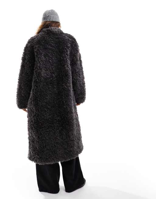 ASOS DESIGN oversized faux fur longline coat in black