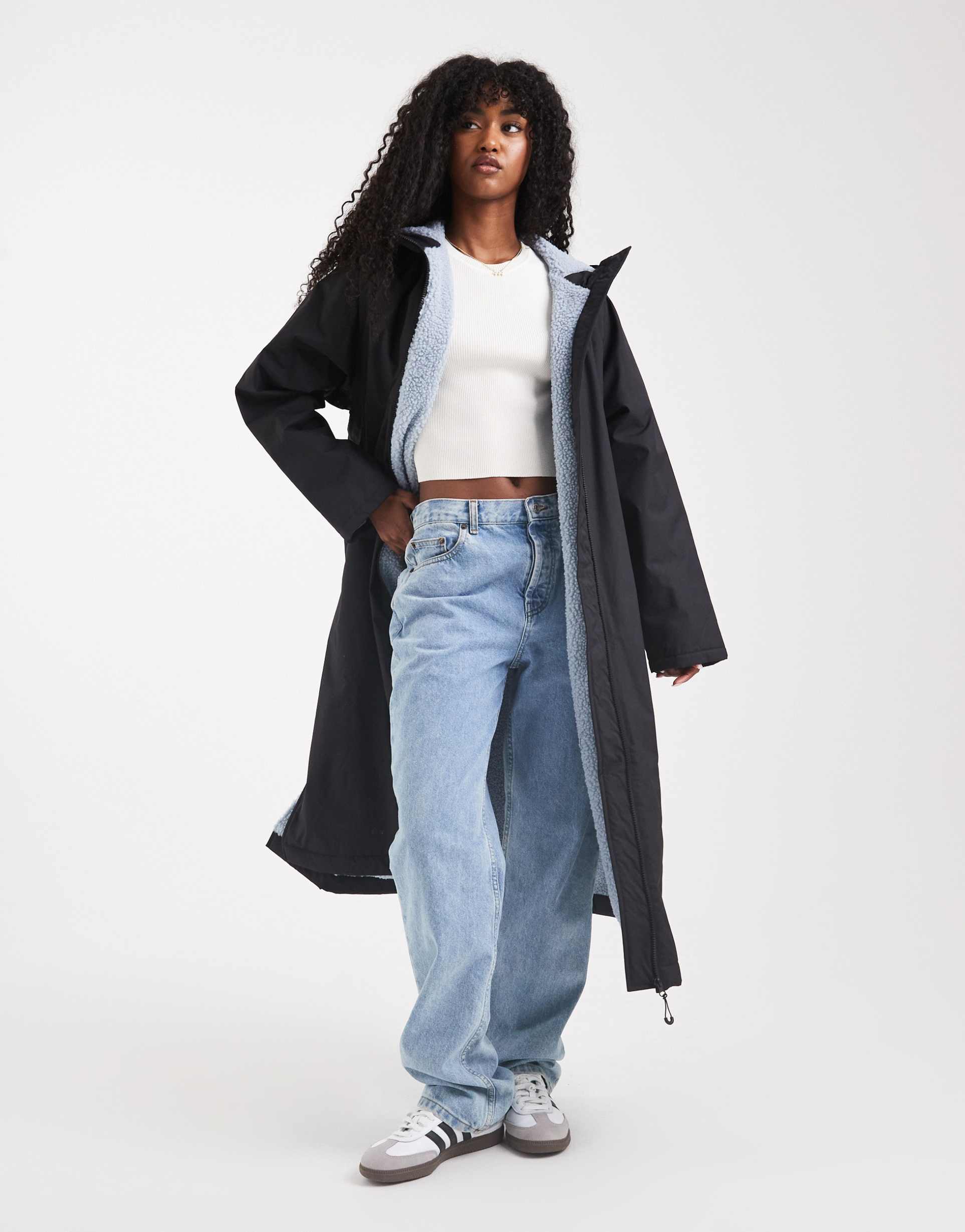 asos design longline fleece lined rain coat in black and blue