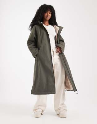 Asos Design Longline Fleece Lined Rain Coat In Green