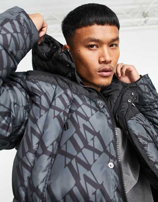 ASOS DESIGN longline puffer jacket in black monogram print