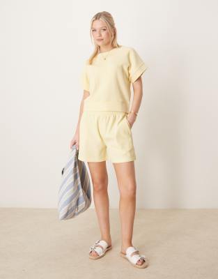 ASOS DESIGN - Longline-Shorts in Zitronengelb mit Waffelstruktur