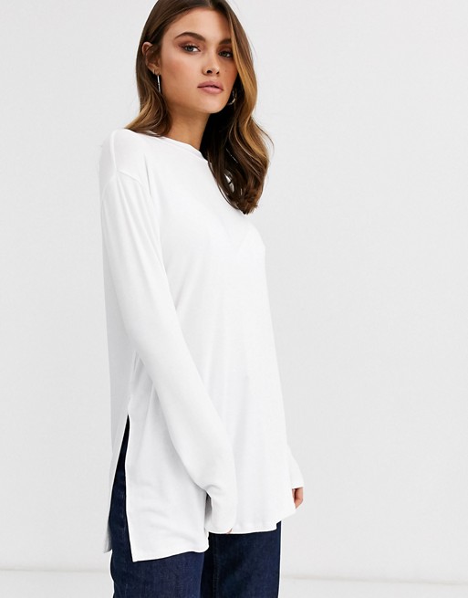 ASOS DESIGN longline top with long sleeve in textured jersey in white