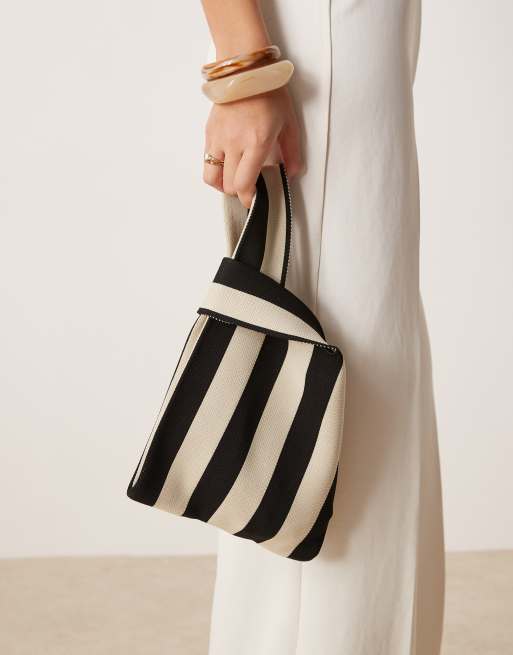 ASOS DESIGN loop through clutch bag in black and cream stripes