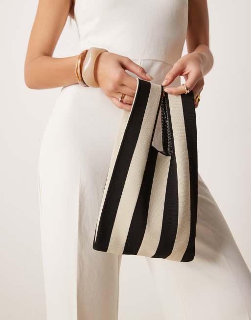 ASOS DESIGN loop through clutch bag in black and cream stripes