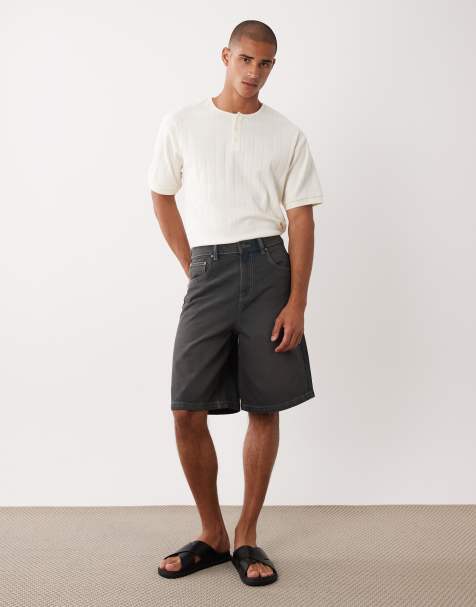 ASOS DESIGN loose denim jorts in dark wash blue with pleats - view 1