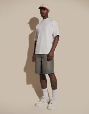 ASOS DESIGN loose denim jorts in dark wash blue | ASOS