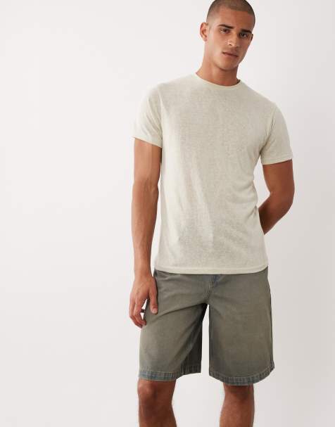 ASOS DESIGN loose denim jorts in dark wash blue - view 1