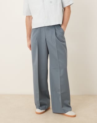 ASOS DESIGN loose fit dress pants with front pleats in dark blue