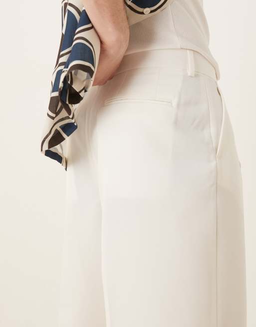 ASOS DESIGN loose fit dress pants with front pleats in white