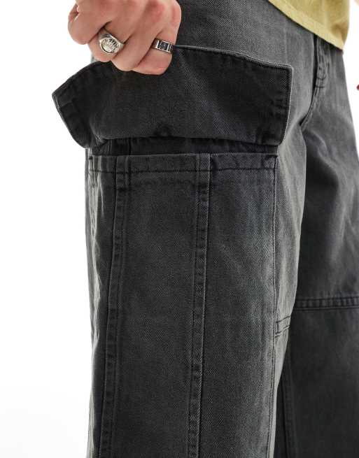 ASOS DESIGN loose fit jeans with cargo pockets in tinted washed black ...