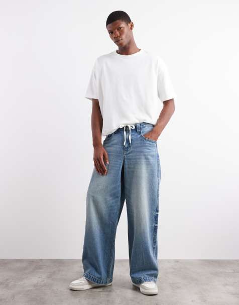 ASOS DESIGN loose fit jeans with embroidered back pocket in light wash blue - view 1