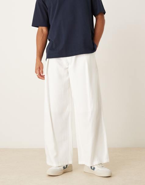 ASOS DESIGN loose fit pants with deep pleat detail in white - view 1