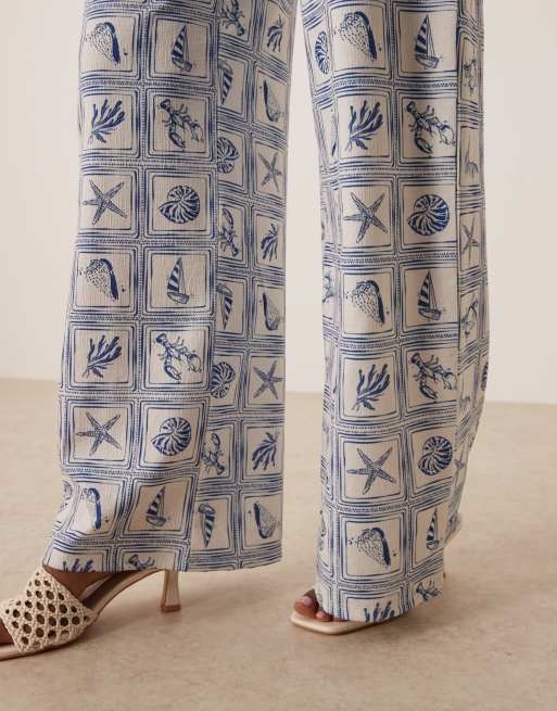 ASOS DESIGN loose fit wide leg pants in shell print - part of a set